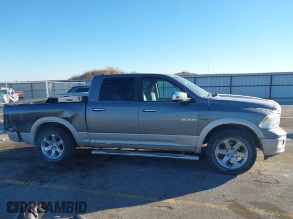 2009 Dodge 1500 Laramie with VIN 1D3HV13T29S778714, listed as a IAAI auction lot 41364288 with 151,451 mi miles and . Bid and sale history available at DreamBid. Image 13.