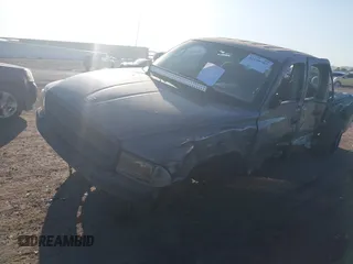 2002 Dodge Dakota with VIN 1B7HG38Z62S553505, listed as a IAAI auction lot 42499787 with 356,218 mi miles and . Bid and sale history available at DreamBid. Image 2.