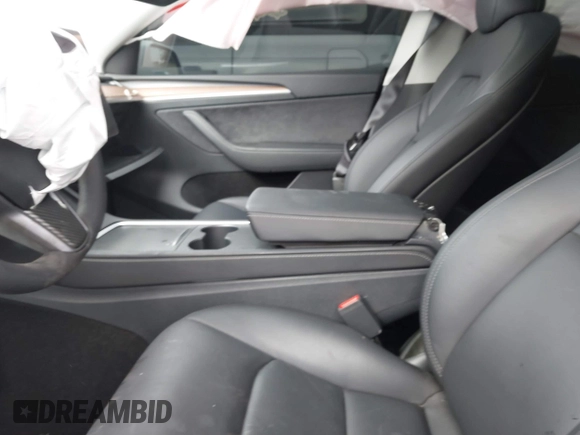 2024 Tesla Model Y with VIN 7SAYGDED2RF207783, listed as a IAAI auction lot 41758143 with Not Provided miles and . Bid and sale history available at DreamBid. Image 5.