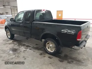 2000 Ford F-150 XL with VIN 1FTRX18W9YNB67215, listed as a IAAI auction lot 42558112 with 118,628 mi miles and . Bid and sale history available at DreamBid. Image 3.