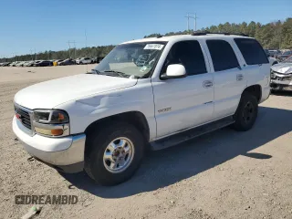 2002 GMC Yukon SLT with VIN 1GKEC13Z32R325662, listed as a Copart auction lot 76667074 with 0 mi miles and Salvage Title. Bid and sale history available at carsss.com. Image 1.