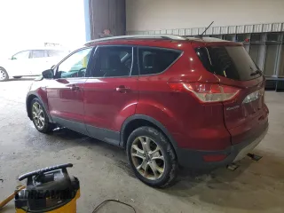 2014 Ford Escape Titanium with VIN 1FMCU9J92EUA80822, listed as a Copart auction lot 47621375 with 235,691 mi miles and Salvage Title. Bid and sale history available at DreamBid. Image 2.