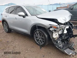 2018 Mazda CX-5 Grand Touring with VIN JM3KFBDM8J0326492, listed as a IAAI auction lot 40928841 with 114,848 mi miles and . Bid and sale history available at DreamBid. Image 1.