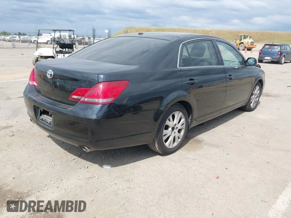 2009 Toyota Avalon XL with VIN 4T1BK36B79U327316, listed as a IAAI auction lot 42130918 with 184,948 mi miles. Bid and sale history available at carsss.com. Image 4.