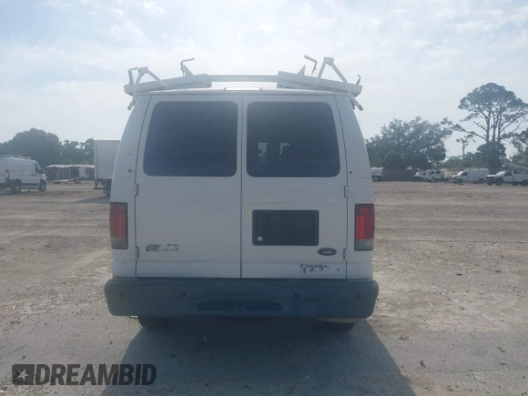 2012 Ford Econoline Cargo Commercial with VIN 1FTNE2EL2CDB10454, listed as a IAAI auction lot 41992574 with 210,118 mi miles and . Bid and sale history available at DreamBid. Image 16.