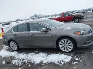 2014 Acura RLX Hybrid Advance Pkg with VIN JH4KC2F92EC000068, listed as a IAAI auction lot 41158553 with 108,325 mi miles. Bid and sale history available at carsss.com. Image 13.