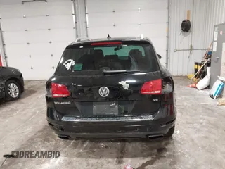 2013 Volkswagen Touareg Exec с VIN WVGEF9BP9DD004013, выставлен на аукционе IAAI как лот 41644882 с пробегом 148 096 миль миль и . История ставок и продаж доступна на DreamBid. Изображение 6.