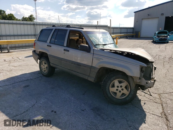 1994 Jeep Grand Cherokee Laredo z VIN 1J4GZ58S5RC328902, wystawiony jako Copart lot #70150474 z przebiegiem 195 604 mil mil oraz Szkoda całkowita • Salvage title. Historia ofert i sprzedaży dostępna na DreamBid. Obrazek 4.