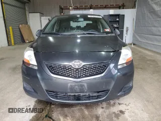 2009 Toyota Yaris z VIN JTDBT903991335683, wystawiony jako Copart lot #52565155 z przebiegiem 143 737 mil mil oraz Szkody całkowita. Historia ofert i sprzedaży dostępna na DreamBid. Obrazek 5.