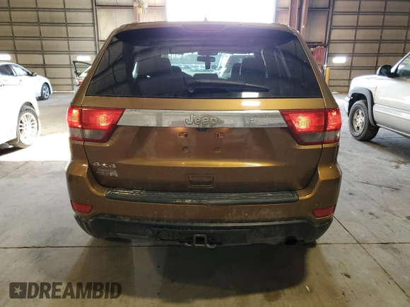 2011 Jeep Grand Cherokee Laredo with VIN 1J4RR4GG6BC675290, listed as a Copart auction lot 47627585 with 142,195 mi miles and Salvage Title. Bid and sale history available at carsss.com. Image 6.