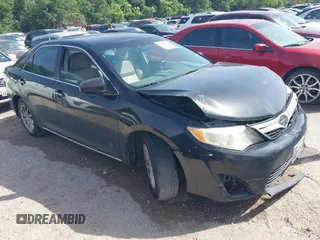 2012 Toyota Camry L z VIN 4T1BF1FK7CU109702, wystawiony jako IAAI lot #42270572 z przebiegiem 182 049 mil mil oraz . Historia ofert i sprzedaży dostępna na DreamBid. Obrazek 1.