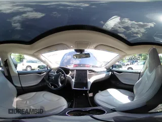 2013 Tesla Model S with VIN 5YJSA1CN0DFP21851, listed as a IAAI auction lot 42557791 with 106,328 mi miles and . Bid and sale history available at DreamBid. Image 22.