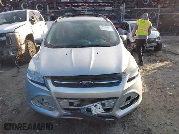2014 Ford Escape SE with VIN 1FMCU9G96EUC53975, listed as a IAAI auction lot 41342661 with 128,594 mi miles. Bid and sale history available at carsss.com. Image 12.