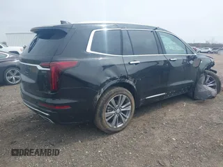 2025 Cadillac XT6 AWD Premium Luxury z VIN 1GYKPDRS3SZ106449, wystawiony jako IAAI lot #41994374 z przebiegiem 3 675 mil mil oraz . Historia ofert i sprzedaży dostępna na DreamBid. Obrazek 4.