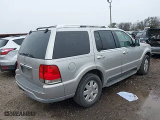 2004 Lincoln Aviator Luxury with VIN 5LMEU68H64ZJ32214, listed as a IAAI auction lot 41641566 with 203,674 mi miles. Bid and sale history available at carsss.com. Image 4.