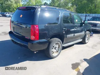 2007 GMC Yukon SLT z VIN 1GKFK13047J289558, wystawiony jako IAAI lot #42315709 z przebiegiem Nie podano mil oraz . Historia ofert i sprzedaży dostępna na DreamBid. Obrazek 4.