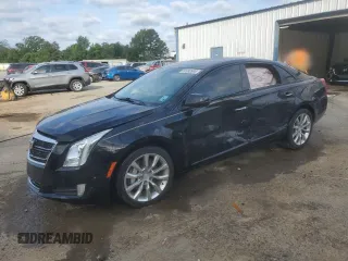 2016 Cadillac XTS Luxury Collection with VIN 2G61M5S36G9111734, listed as a Copart auction lot 52993995 with 102,799 mi miles and Salvage title. Bid and sale history available at DreamBid. Image 1.