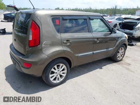 2012 Kia Soul + with VIN KNDJT2A66C7440908, listed as a IAAI auction lot 42049004 with 63,083 mi miles and . Bid and sale history available at DreamBid. Image 4.