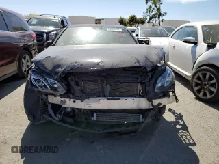 2014 Mercedes-Benz E 550 Sport with VIN WDDHF9BB8EA853354, listed as a Copart auction lot 56666184 with 127,145 mi miles and Salvage Title. Bid and sale history available at DreamBid. Image 5.