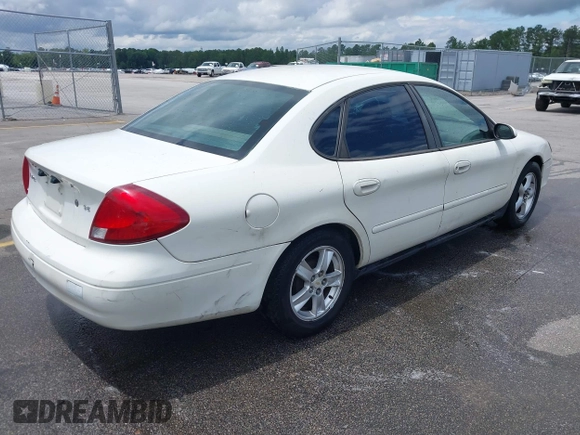 2003 Ford Taurus SE Standard with VIN 1FAFP53U13A192387, listed as a IAAI auction lot 42398723 with 247,077 mi miles and . Bid and sale history available at DreamBid. Image 4.