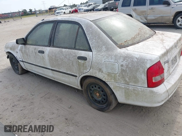 2003 Mazda Protege DX with VIN JM1BJ225730146488, listed as a IAAI auction lot 42086747 with Not Provided miles and . Bid and sale history available at DreamBid. Image 3.