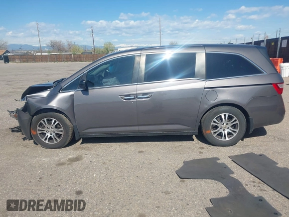 2012 Honda Odyssey EX-L with VIN 5FNRL5H61CB095789, listed as a IAAI auction lot 42065507 with 138,570 mi miles and . Bid and sale history available at DreamBid. Image 14.