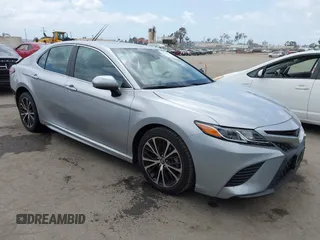 2018 Toyota Camry LE z VIN 4T1B11HK5JU014158, wystawiony jako IAAI lot #42129611 z przebiegiem 68 869 mil mil oraz . Historia ofert i sprzedaży dostępna na DreamBid. Obrazek 1.