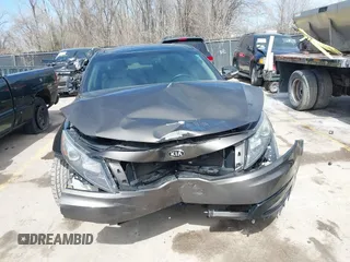 2013 Kia Optima EX with VIN 5XXGN4A77DG234921, listed as a IAAI auction lot 41823669 with 168,460 mi miles. Bid and sale history available at carsss.com. Image 6.