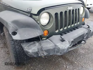 2007 Jeep Wrangler Unlimited X with VIN 1J4GA39127L231378, listed as a IAAI auction lot 42252475 with 152,568 mi miles and . Bid and sale history available at DreamBid. Image 6.