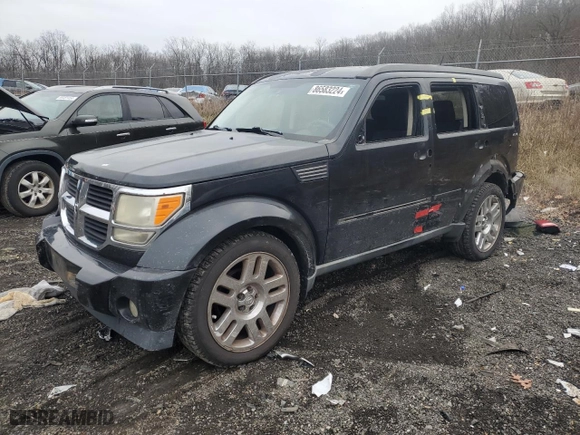 2009 Dodge Nitro SXT with VIN 1D8GU28K69W522373, listed as a Copart auction lot 86583224 with 254,849 mi miles and Salvage Title. Bid and sale history available at carsss.com. Image 1.