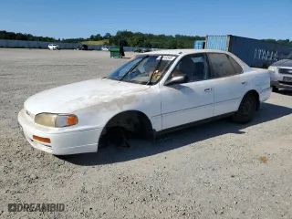 1996 Toyota Camry DX with VIN JT2BG12K7T0351784, listed as a Copart auction lot 52815345 with 303,537 mi miles and Clean Title. Bid and sale history available at carsss.com. Image 1.