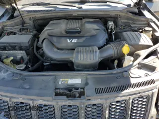 2015 Jeep Grand Cherokee Overland with VIN 1C4RJFCG3FC104439, listed as a Copart auction lot 50780295 with 196,549 mi miles and Salvage Title. Bid and sale history available at carsss.com. Image 13.