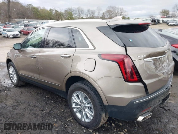 2023 Cadillac XT5 FWD Luxury z VIN 1GYKNAR45PZ140440, wystawiony jako IAAI lot #41723317 z przebiegiem 25 124 mil mil oraz . Historia ofert i sprzedaży dostępna na DreamBid. Obrazek 14.