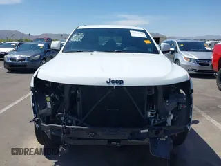 2018 Jeep Grand Cherokee Altitude z VIN 1C4RJEAG8JC380640, wystawiony jako IAAI lot #42336318 z przebiegiem 109 675 mil mil oraz . Historia ofert i sprzedaży dostępna na DreamBid. Obrazek 13.
