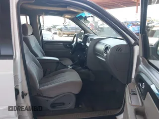 2004 GMC Envoy SLT with VIN 1GKDS13S442217242, listed as a IAAI auction lot 42573887 with 210,296 mi miles and . Bid and sale history available at DreamBid. Image 5.