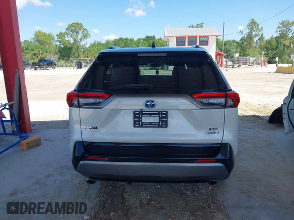 2021 Toyota RAV4 Hybrid XSE with VIN 2T3E6RFV9MW019837, listed as a IAAI auction lot 42002574 with 74,214 mi miles. Bid and sale history available at carsss.com. Image 17.