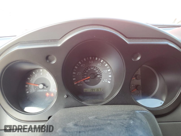 2003 Nissan Frontier XE with VIN 1N6ED27T13C409632, listed as a Copart auction lot 84884434 with 194,167 mi miles and Salvage title. Bid and sale history available at DreamBid. Image 9.