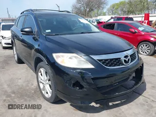 2011 Mazda CX-9 Grand Touring with VIN JM3TB3DA5B0300784, listed as a IAAI auction lot 41816110 with 138,523 mi miles and . Bid and sale history available at DreamBid. Image 1.