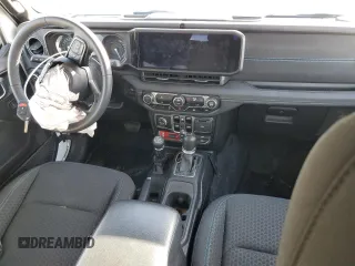 2024 Jeep Wrangler Rubicon with VIN 1C4RJXR6XRW115879, listed as a Copart auction lot 45816825 with 34,557 mi miles and Salvage Title. Bid and sale history available at DreamBid. Image 8.