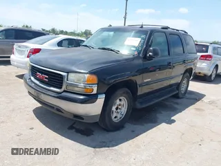 2003 GMC Yukon SLT with VIN 1GKEC13Z03R279919, listed as a IAAI auction lot 42044698 with 1 mi miles. Bid and sale history available at carsss.com. Image 2.