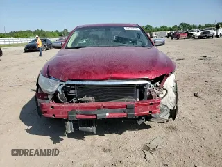 2014 Ford Taurus Limited z VIN 1FAHP2F82EG141034, wystawiony jako Copart lot #52579995 z przebiegiem 207 709 mil mil oraz Szkoda całkowita • Salvage title. Historia ofert i sprzedaży dostępna na DreamBid. Obrazek 10.