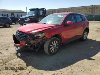 2016 Mazda CX-5 Sport with VIN JM3KE4BY8G0635800, listed as a Copart auction lot 51293125 with 82,064 mi miles and Salvage Title. Bid and sale history available at carsss.com. Image 1.