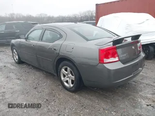 2009 Dodge Charger SXT with VIN 2B3KA33V59H573761, listed as a IAAI auction lot 41545196 with 172,065 mi miles and . Bid and sale history available at carsss.com. Image 3.