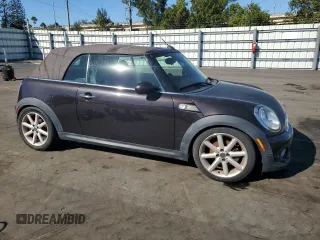 2013 MINI Convertible with VIN WMWZN3C51DT266291, listed as a Copart auction lot 46615095 with 134,832 mi miles and Clean Title. Bid and sale history available at DreamBid. Image 4.