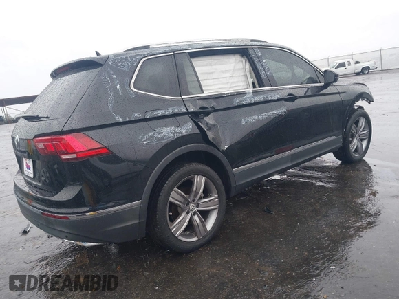 2021 Volkswagen Tiguan SE with VIN 3VV3B7AX3MM058751, listed as a IAAI auction lot 41527365 with 19,646 mi miles and . Bid and sale history available at DreamBid. Image 4.