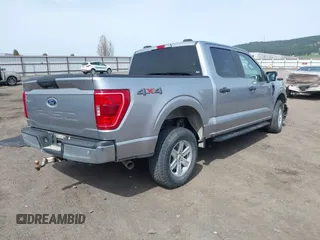 2021 Ford F-150 XL z VIN 1FTFW1E5XMFA28555, wystawiony jako IAAI lot #41814344 z przebiegiem 31 680 mil mil oraz . Historia ofert i sprzedaży dostępna na DreamBid. Obrazek 4.