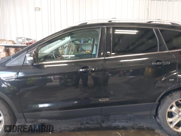 2015 Ford Escape Titanium with VIN 1FMCU9J98FUC70495, listed as a IAAI auction lot 41978543 with 129,974 mi miles. Bid and sale history available at carsss.com. Image 14.