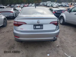 2019 Volkswagen Jetta GLI S z VIN 3VW5T7BU4KM165083, wystawiony jako IAAI lot #40729763 z przebiegiem 75 414 mil mil oraz . Historia ofert i sprzedaży dostępna na DreamBid. Obrazek 16.