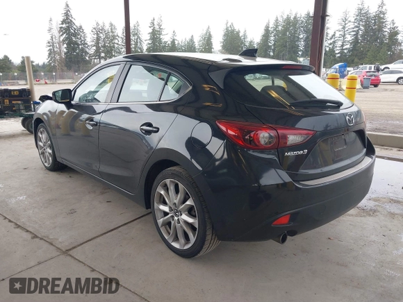 2014 Mazda 3 S Grand Touring with VIN JM1BM1M31E1150126, listed as a IAAI auction lot 41813519 with 103,578 mi miles and . Bid and sale history available at DreamBid. Image 3.