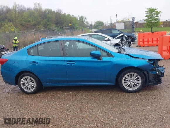 2017 Subaru Impreza Premium z VIN 4S3GKAB68H3610559, wystawiony jako IAAI lot #42156102 z przebiegiem 79 548 mil mil oraz . Historia ofert i sprzedaży dostępna na DreamBid. Obrazek 13.